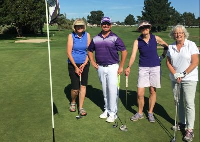 Coach Pete golfing with the ladies
